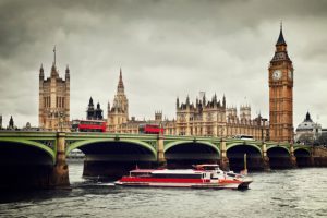 London. Big Ben, River Thames, red buses and boat vintage